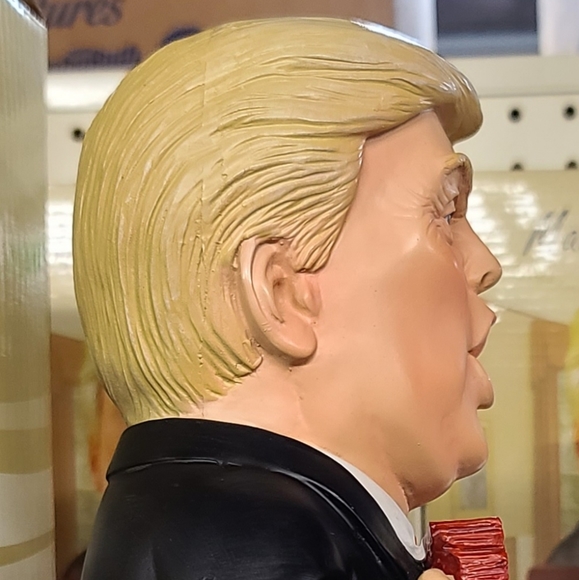 Donald Trump Holding "America First" Sign - Picture 4 of 5